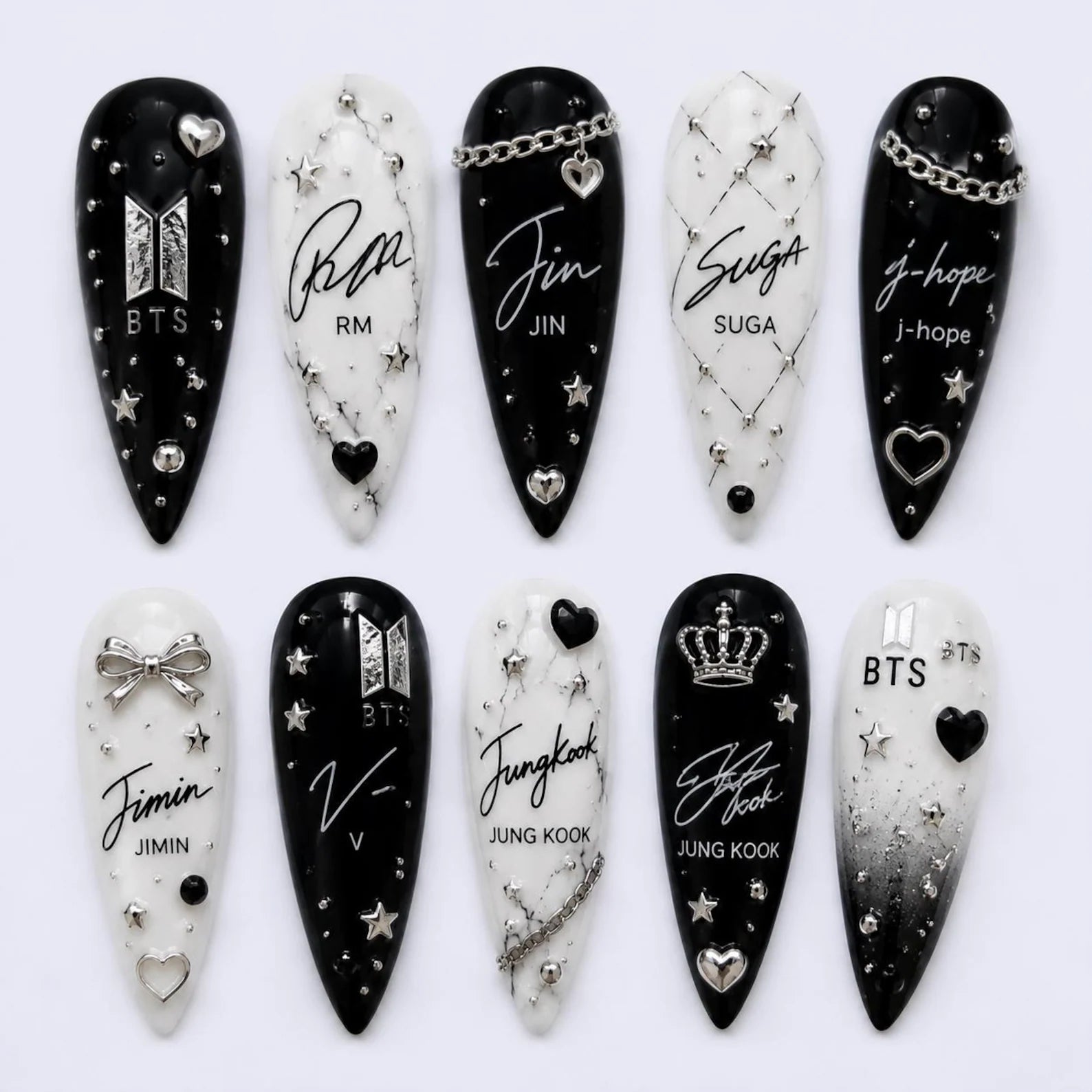 Set of black and white nail art designs with BTS names