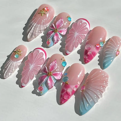 Decorative nail art designs with pink and blue flowers