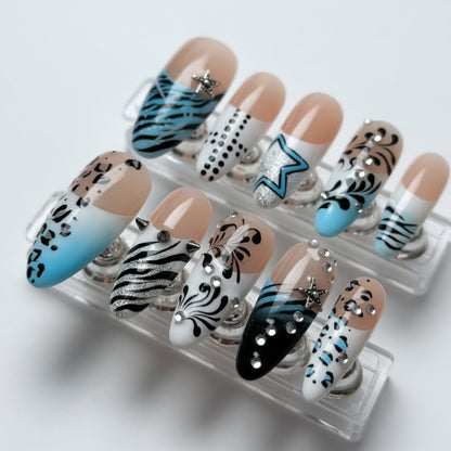 Set of nail art designs on a clear display stand with a white background