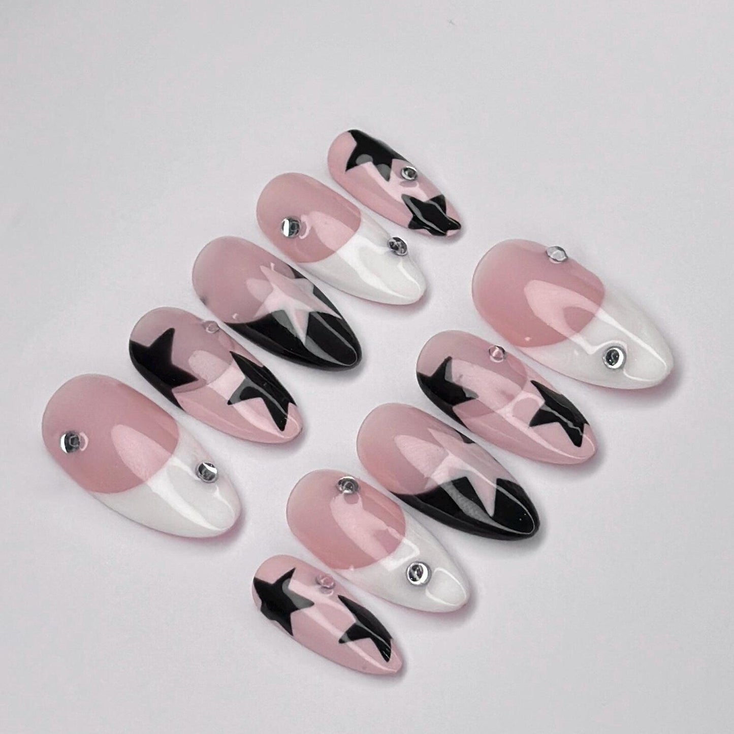 pink-black-star-kpop-nails